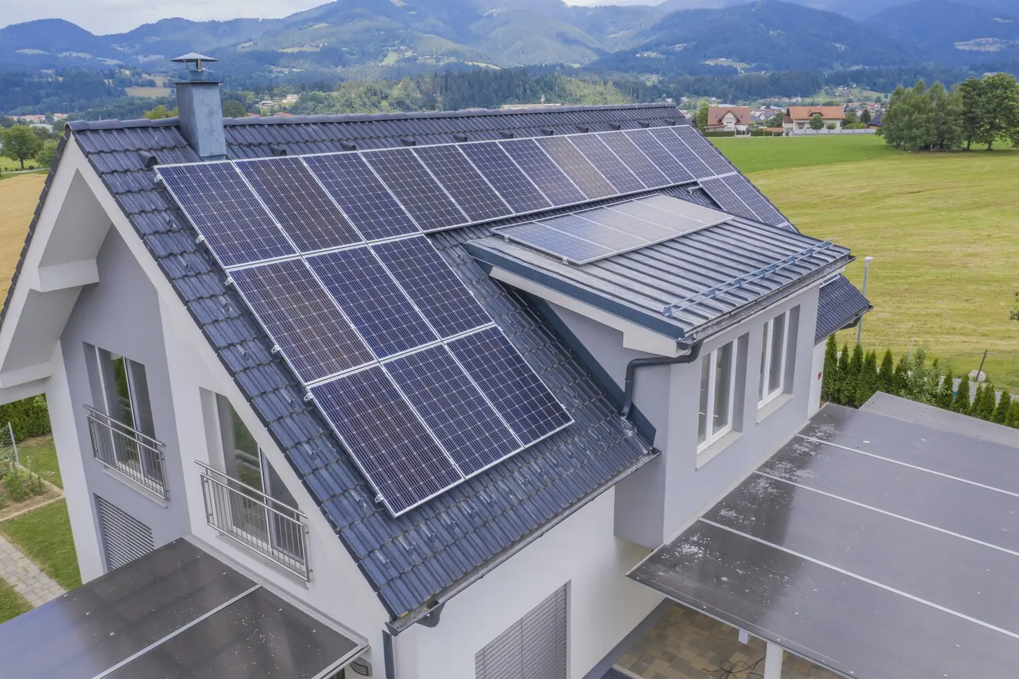 aerial-view-private-house-with-solar-panels-roof_181624-14677
